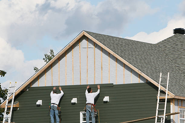 Professional Siding technician working in Saint Leonard, MD
